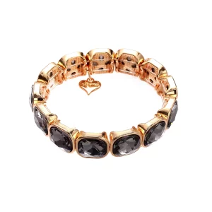 Armband , Guld med Svart glittrig sten från Gemini